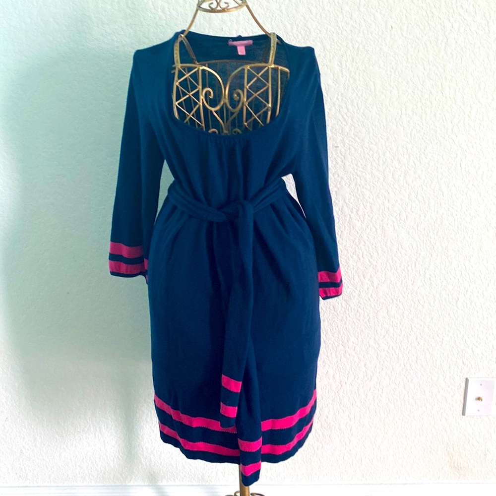 Never worn, but it has a moth hole